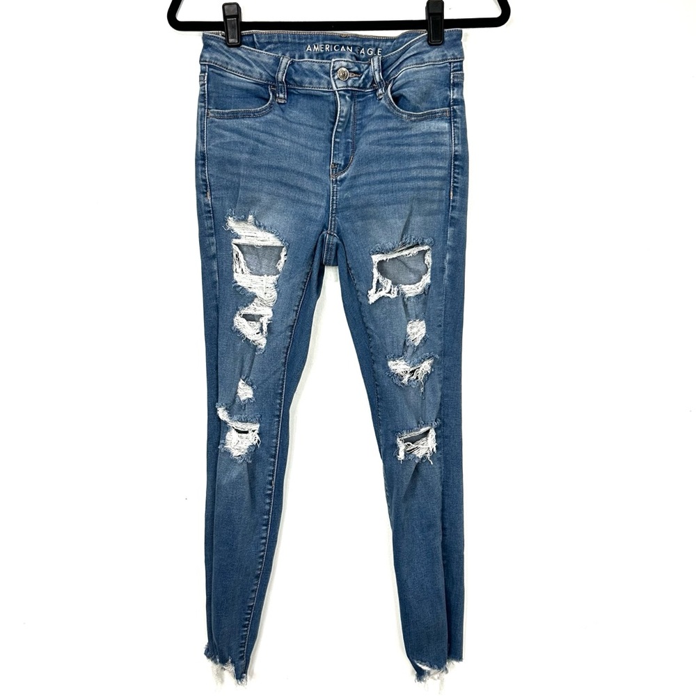 AMERICAN EAGLE distressed skinny jeans Q5